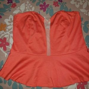 Strapless orange peplum top